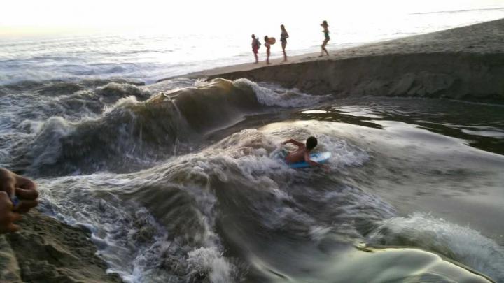 Riding nature's waterslide.